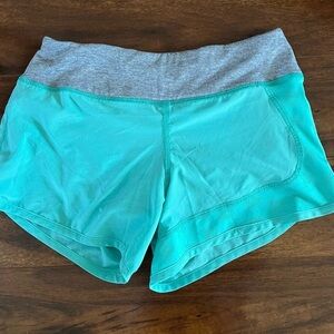 Women's Rabbit Teal and purple green Shorts 4 inch inseams size xs